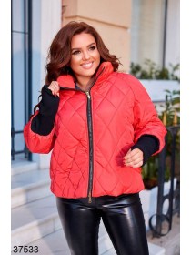 Жіноча коротка стьобана куртка з в'язаними рукавами