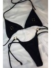 Черный женский треугольный купальник на завязках с пирсингом